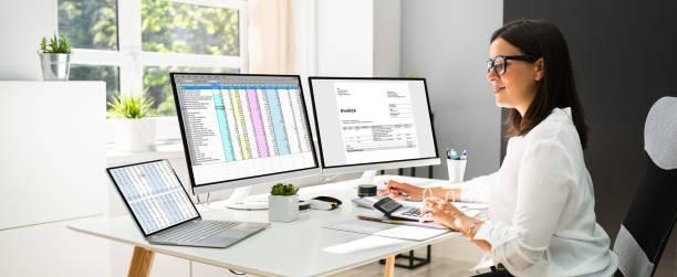 Online Taxes And Invoice Using Computer Online Taxes And Invoice Using Computer And Calculator accounting software stock pictures, royalty-free photos & images